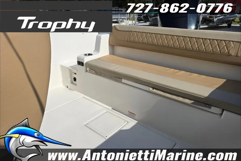 Slide: The Image of 2025 Trophy T22 SC boat interior with steering console and seating. - 78