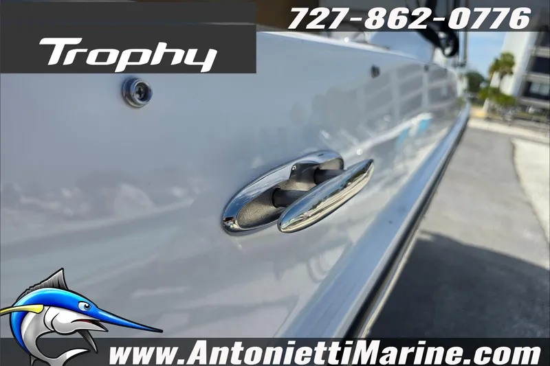 Slide: The Image of 2025 Trophy T22 SC boat interior with Simrad navigation system, showcased by Antonietti Marine. - 80