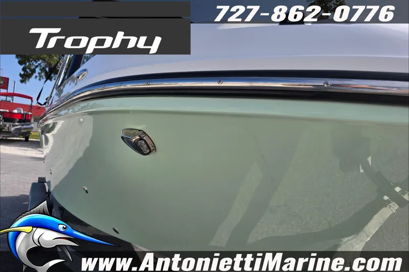 Slide: The Image of 2025 Trophy T22 SC boat deck with logo and contact details. - 83