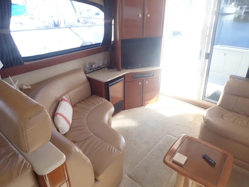 Slide: The Image of Interior of 2006 Meridian 411 Sedan yacht with leather seating and TV. - 10