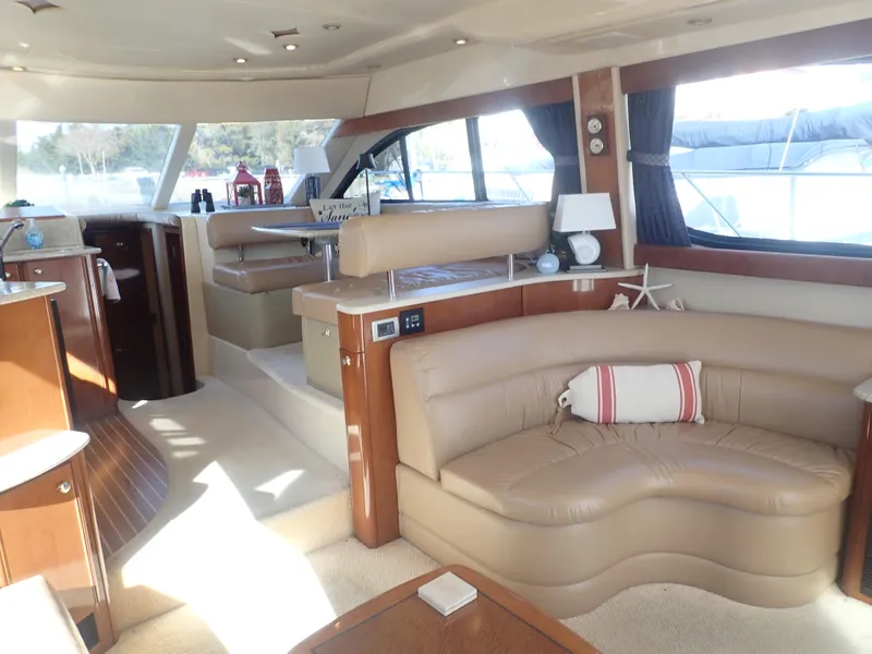 Slide: The Image of Luxurious interior of 2006 Meridian 411 Sedan yacht with leather seating and elegant decor. - 12