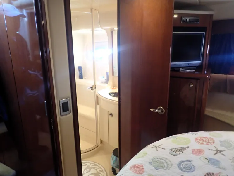 Slide: The Image of Interior of 2006 Meridian 411 Sedan yacht with bathroom and TV. - 23