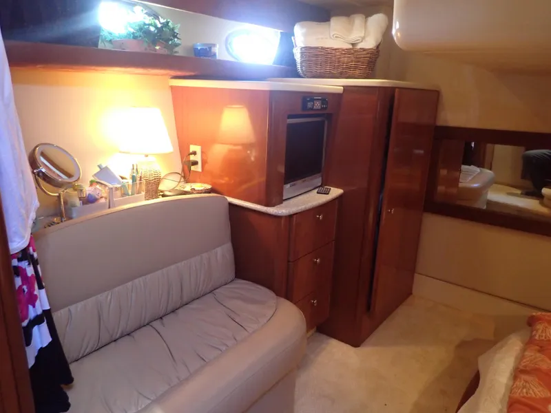 Slide: The Image of Luxurious interior of 2006 Meridian 411 Sedan yacht with cozy seating and elegant decor. - 27