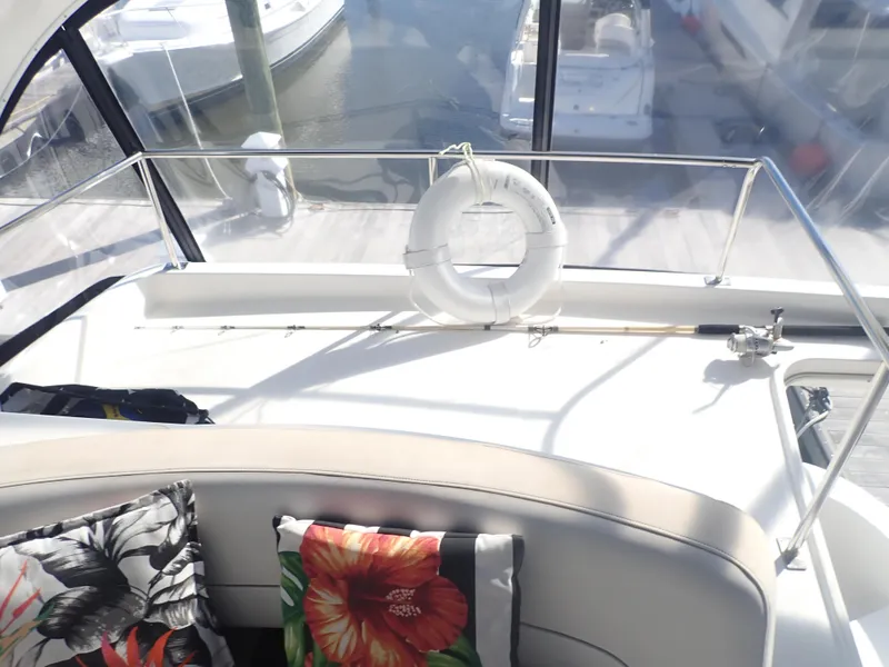 Slide: The Image of 2006 Meridian 411 Sedan interior with floral cushions and life preserver. - 35