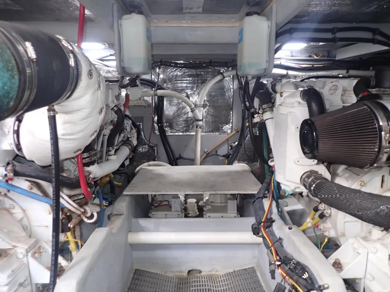 Slide: The Image of Engine room of a 2006 Meridian 411 Sedan, showcasing mechanical components and wiring. - 45