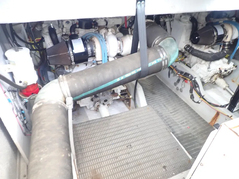 Slide: The Image of Engine room of a 2006 Meridian 411 Sedan with visible components and piping. - 46