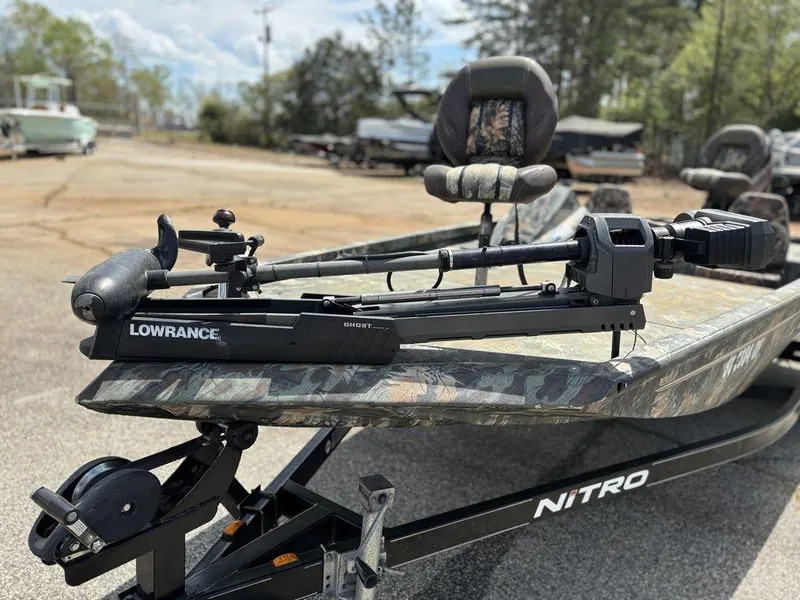 Slide: The Image of Fishing boat with Lowrance equipment on a Ranger RC188, 2015 model, parked outdoors. - 11
