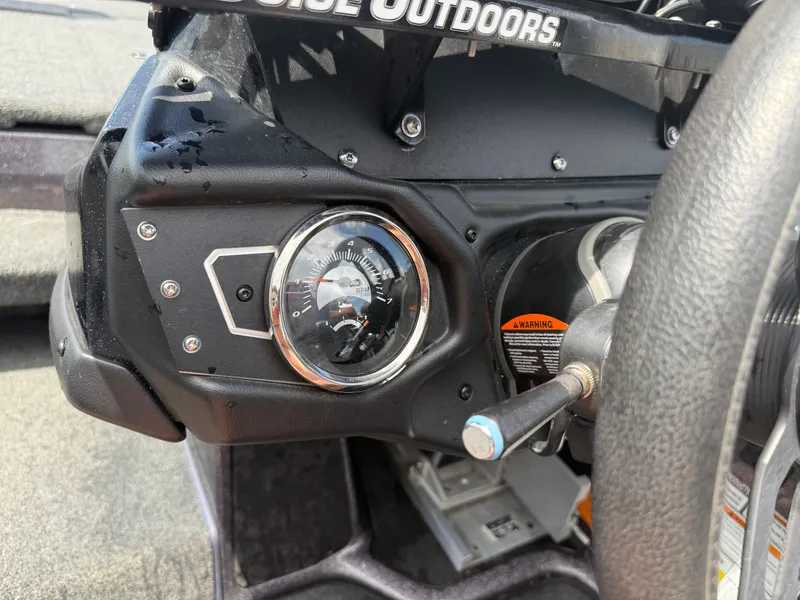 Slide: The Image of 2023 Skeeter ZXR 20 dashboard with gauge and steering wheel detail. - 24