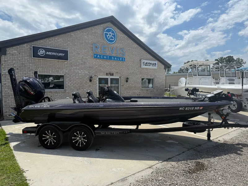 Slide: The Image of 2023 Skeeter ZXR 20 boat parked outside Revic Yacht Sales building. - 3