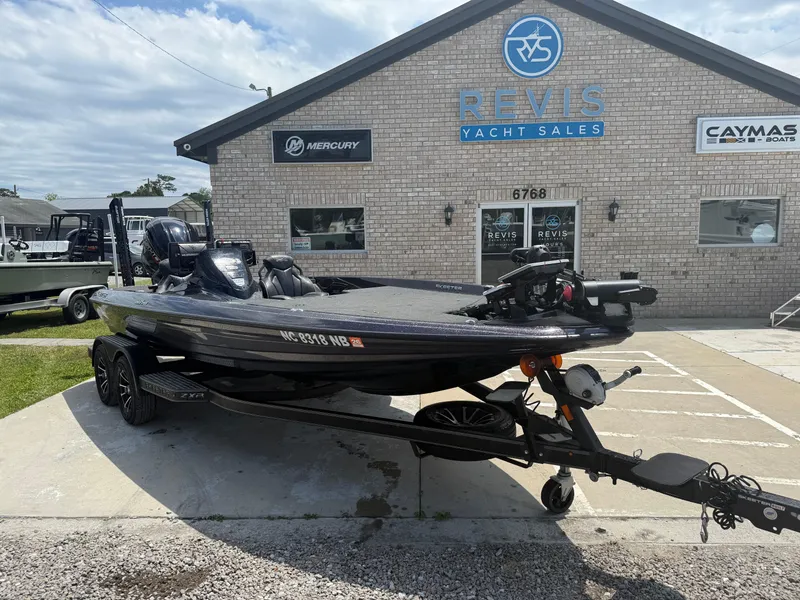 Slide: The Image of 2023 Skeeter ZXR 20 boat parked outside Revis Yacht Sales building. - 4