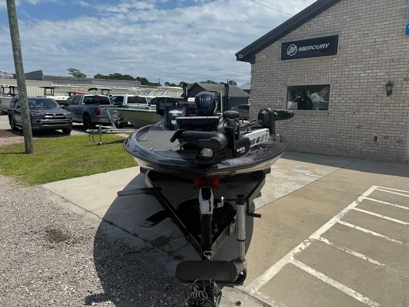 Slide: The Image of 2023 Skeeter ZXR 20 boat parked outside a Mercury dealership. - 5