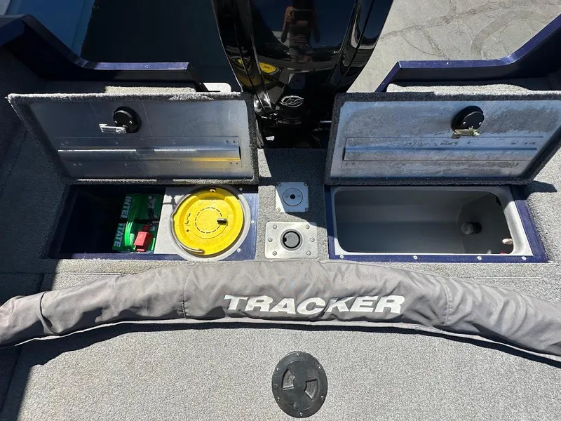 Slide: The Image of 2019 Tracker Pro Guide V-175 Combo boat storage compartments open, showcasing interior features. - 14