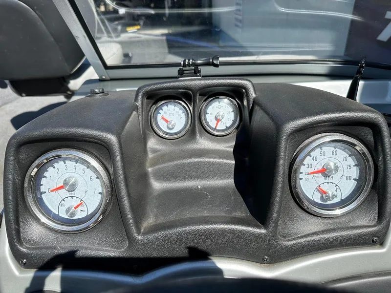 Slide: The Image of Dashboard of 2019 Tracker Pro Guide V-175 Combo boat with gauges and controls. - 28