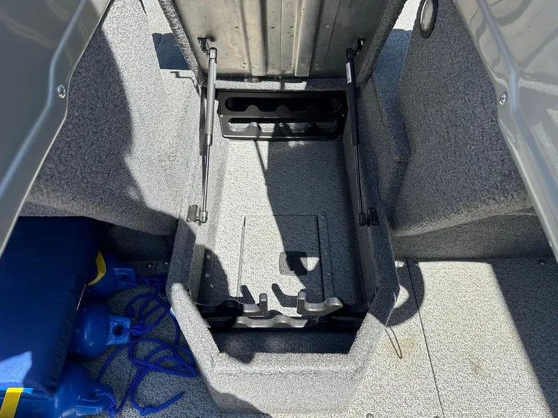 Slide: The Image of 2019 Tracker Pro Guide V-175 Combo boat interior with storage compartment and accessories. - 31