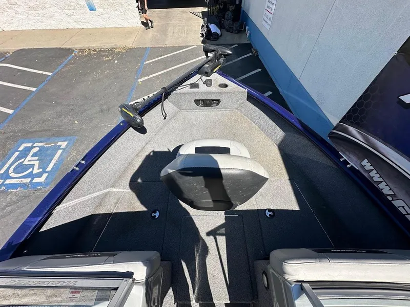 Slide: The Image of 2019 Tracker Pro Guide V-175 Combo boat interior with seating and trolling motor. - 32