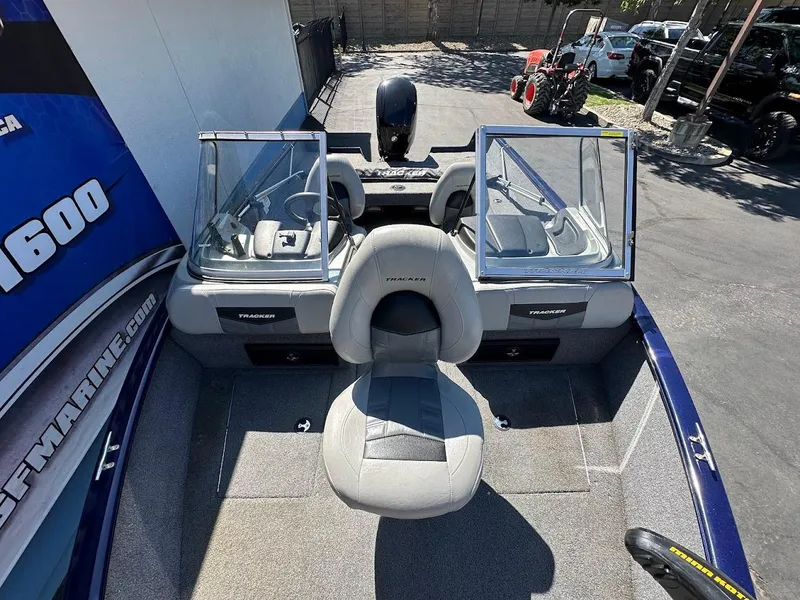 Slide: The Image of 2019 Tracker Pro Guide V-175 Combo boat interior with seating and windshield. - 35