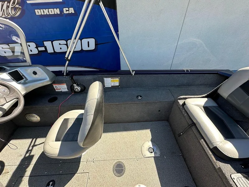 Slide: The Image of 2019 Tracker Pro Guide V-175 Combo interior with seating and control panel. - 39
