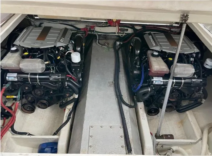 Slide: The Image of Engine compartment of a 1997 Little Harbor WhisperJet 36, featuring twin inboard engines. - 15