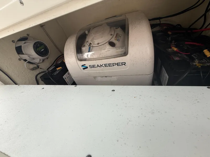 Slide: The Image of 2024 Key West 291 FS boat with Seakeeper stabilizer and battery compartment. - 9