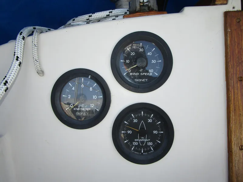Slide: The Image of Gauges on a 1974 Irwin Competition 30 sailboat dashboard, showing wind speed and direction. - 6