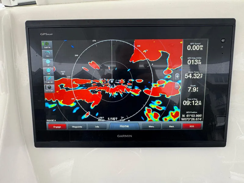 Slide: The Image of Garmin GPS display on 2019 Regulator 31 boat showing radar and navigation data. - 10