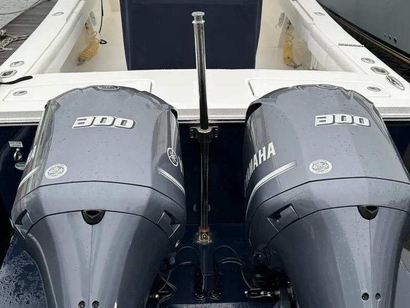 Slide: The Image of 2019 Regulator 31 boat with twin Yamaha 300 engines, rear view. - 3