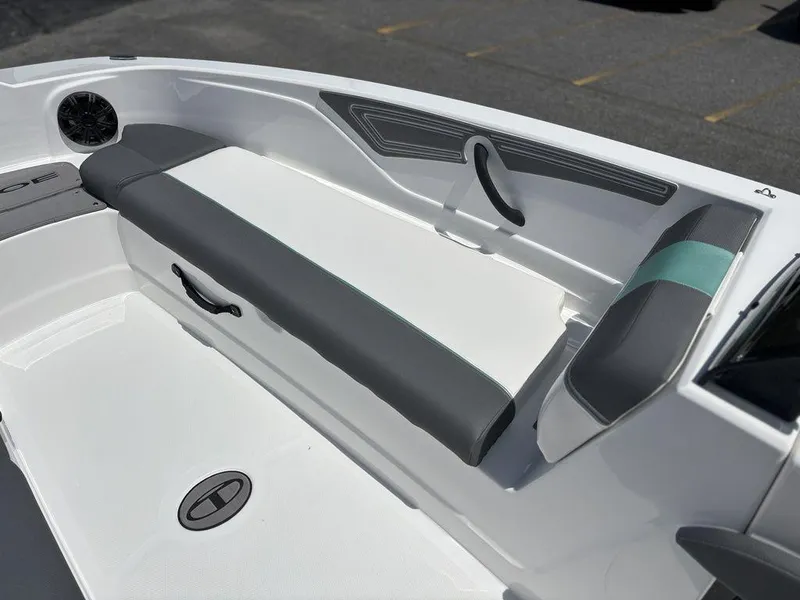 Slide: The Image of 2025 Tahoe T21 boat interior with gray and white seating, modern design. - 11