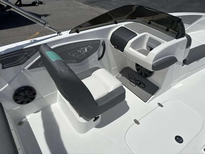 Slide: The Image of 2025 Tahoe T21 boat interior with modern dashboard and seating. - 16