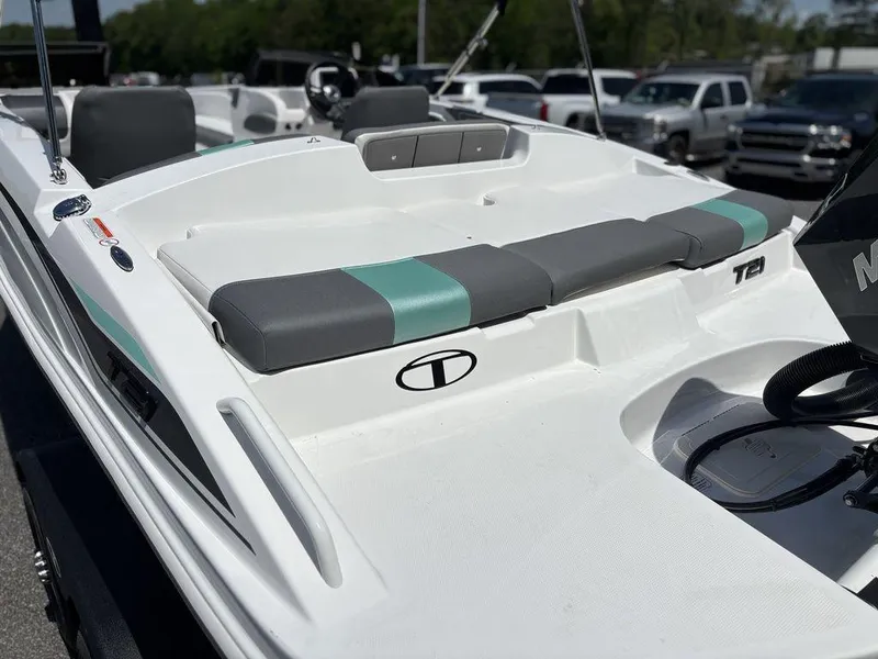 Slide: The Image of 2025 Tahoe T21 boat with sleek seating and modern design. - 24