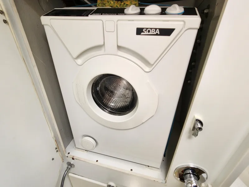 Slide: The Image of Compact washing machine installed in a 2006 Hallberg-Rassy 48 yacht. - 48