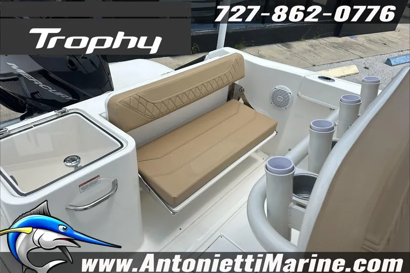 Slide: The Image of 2025 Trophy T24 CC boat interior with seating and storage, Antonietti Marine contact details. - 11