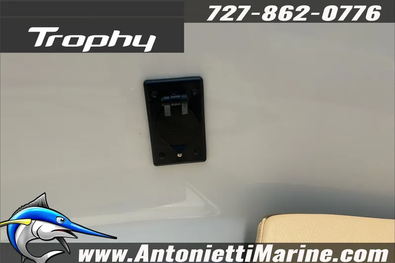 Slide: The Image of 2025 Trophy T24 CC boat detail with contact info and logo. - 21