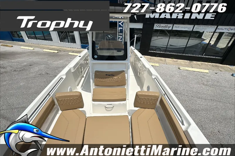 Slide: The Image of 2025 Trophy T24 CC boat with tan seating, displayed at Antonietti Marine. - 22