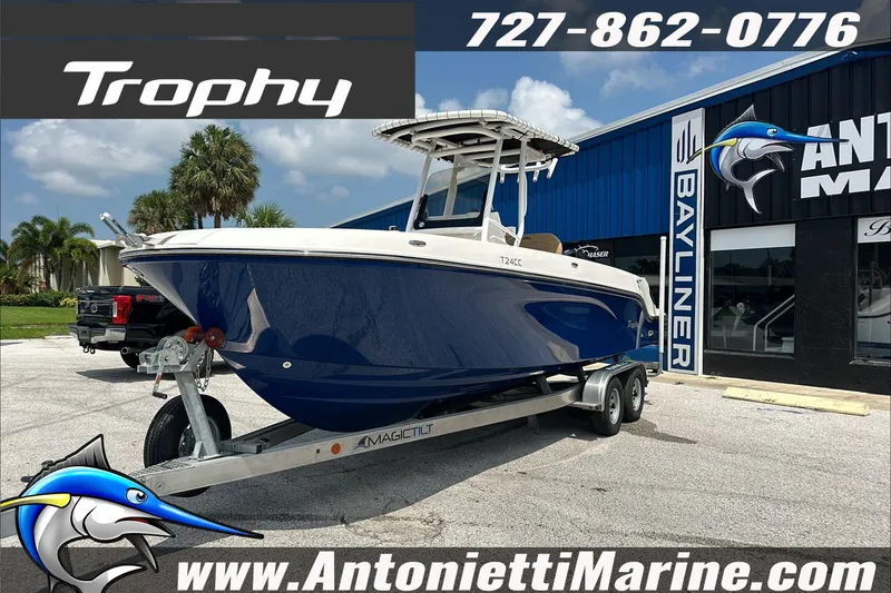 Slide: The Image of 2025 Trophy T24 CC boat on trailer at Antonietti Marine dealership. - 4