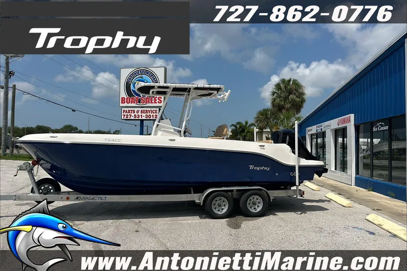 Slide: The Image of 2025 Trophy T24 CC boat on trailer at Antonietti Marine dealership. - 5