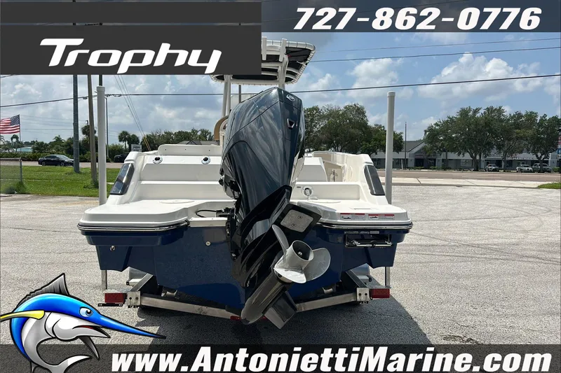 Slide: The Image of 2025 Trophy T24 CC boat with outboard motor, displayed at Antonietti Marine dealership. - 7