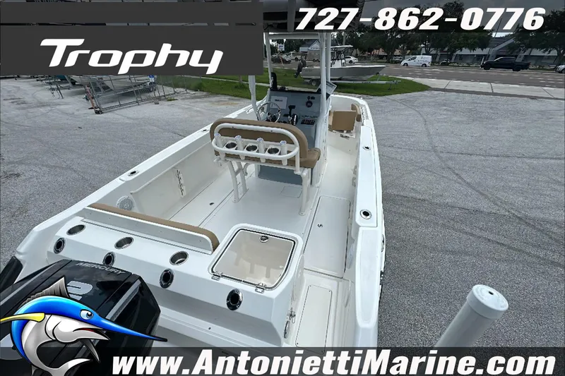 Slide: The Image of 2025 Trophy T24 CC boat interior with seating and controls, displayed at Antonietti Marine. - 9