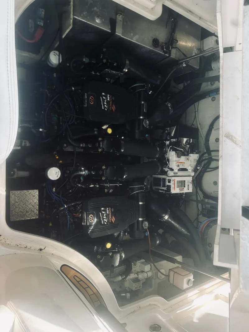 Slide: The Image of Engine compartment of a 2006 Sea Ray 320 Sundancer boat. - 29