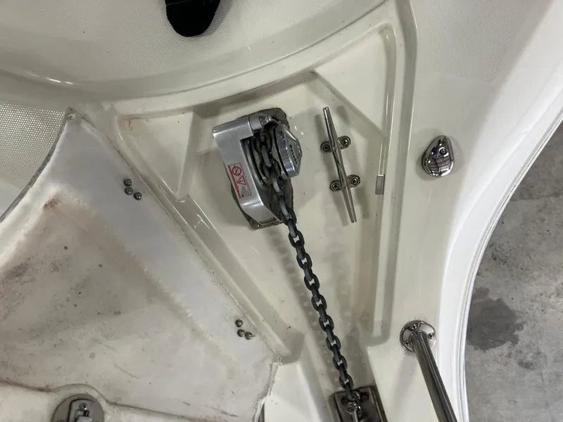 Slide: The Image of Anchor chain mechanism on 2012 Striper 2901 Walkaround I/O boat. - 17