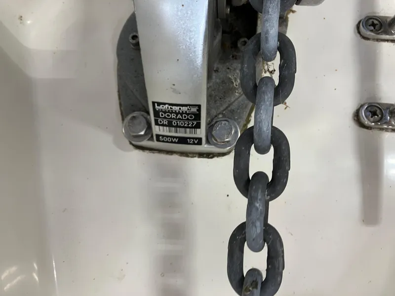 Slide: The Image of Anchor chain mechanism on 2012 Striper 2901 Walkaround I/O boat. - 18