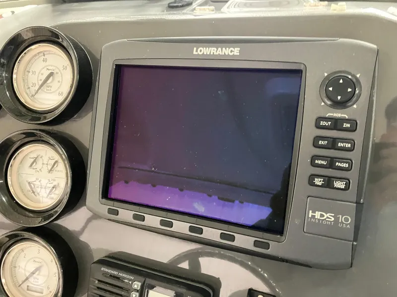 Slide: The Image of Lowrance HDS 10 display on 2012 Striper 2901 Walkaround I/O boat dashboard. - 31