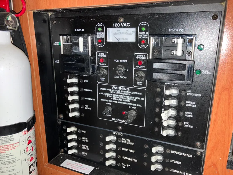 Slide: The Image of Electrical panel of 2012 Striper 2901 Walkaround I/O boat with fire extinguisher. - 40