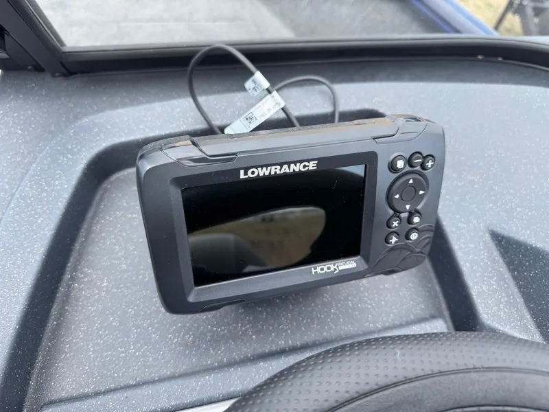 Slide: The Image of Lowrance Hook fish finder on 2025 Tracker Pro Guide V-175 WT dashboard. - 8