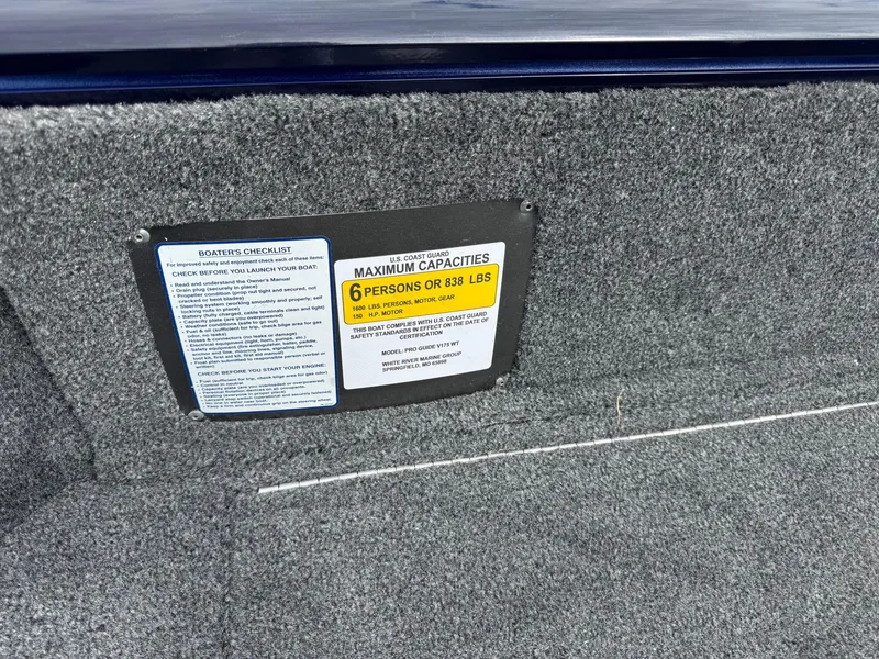 Slide: The Image of 2025 Tracker Pro Guide V-175 WT boat capacity label, maximum 6 persons or 838 lbs. - 9