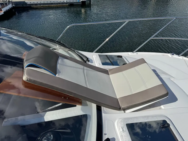 Slide: The Image of Sun lounger on 2018 Cutwater C-242 Coupe yacht, overlooking water. - 30