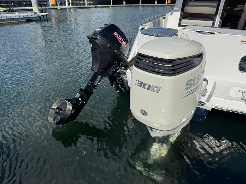 Slide: The Image of Outboard motor on a 2018 Cutwater C-242 Coupe boat in water. - 32