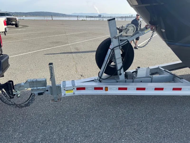 Slide: The Image of Trailer hitch of a 2018 Cutwater C-242 Coupe boat in a parking lot. - 38