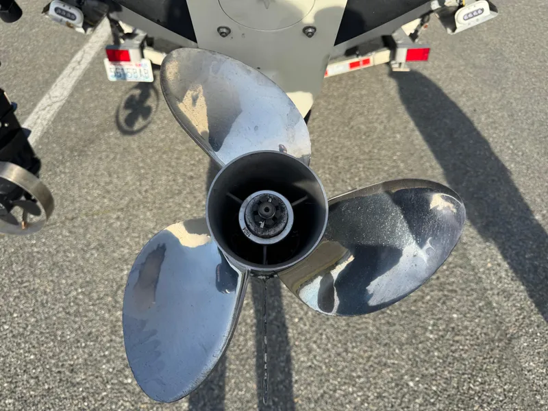 Slide: The Image of Propeller of 2018 Cutwater C-242 Coupe boat on asphalt surface. - 40