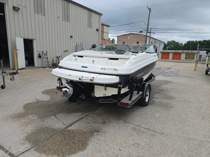 Slide: The Image of 2007 Chaparral 190 SSi boat on trailer in industrial area. - 5