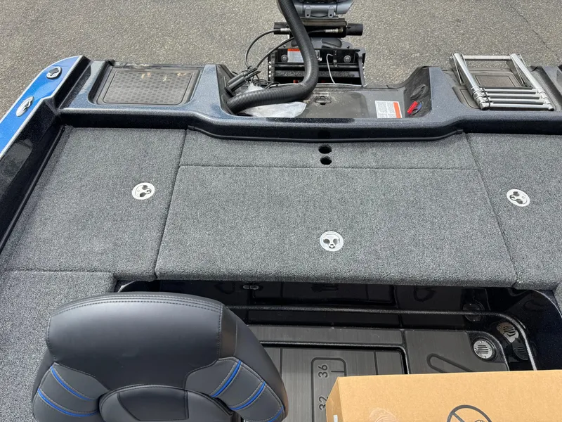 Slide: The Image of 2025 Nitro ZV21 Pro boat interior with seating and storage compartments. - 13